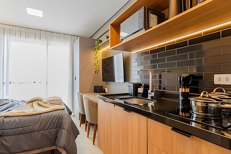 Conforto no coração de Curitiba: estúdio completo